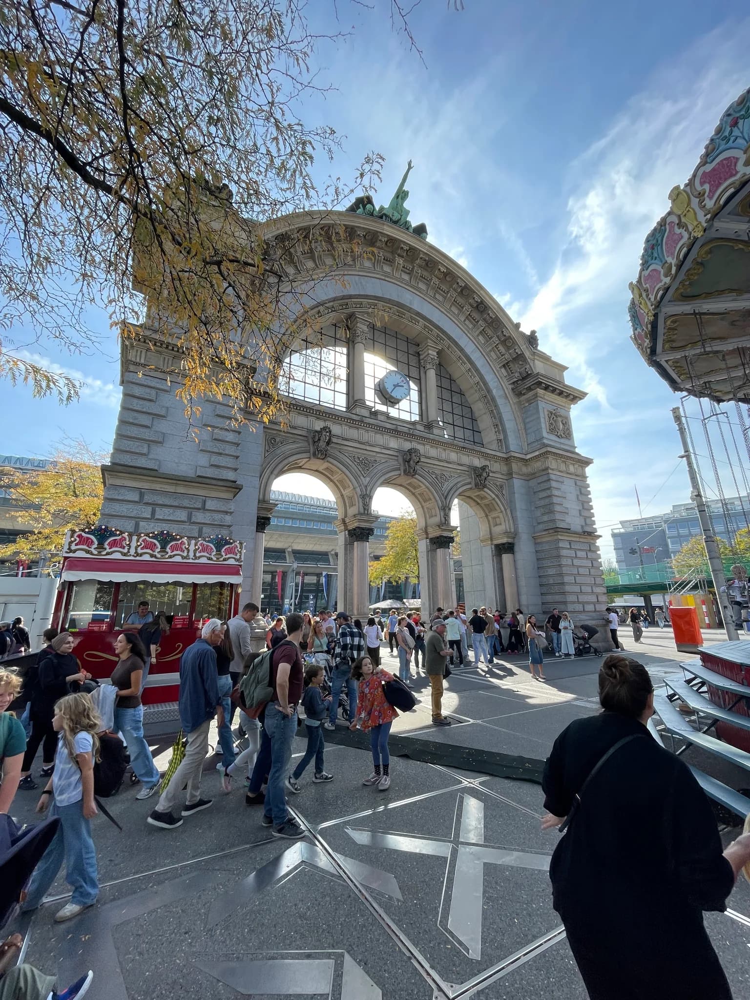 Historic portal of the former Lucerne railway station beside the autumn fair