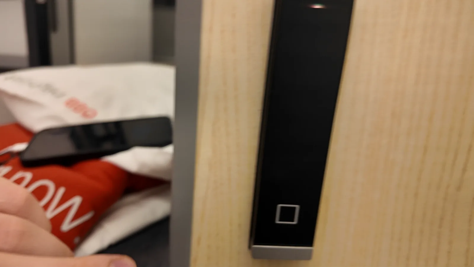 Black access-card reader beside an ÖBB Nightjet Mini Cabin door