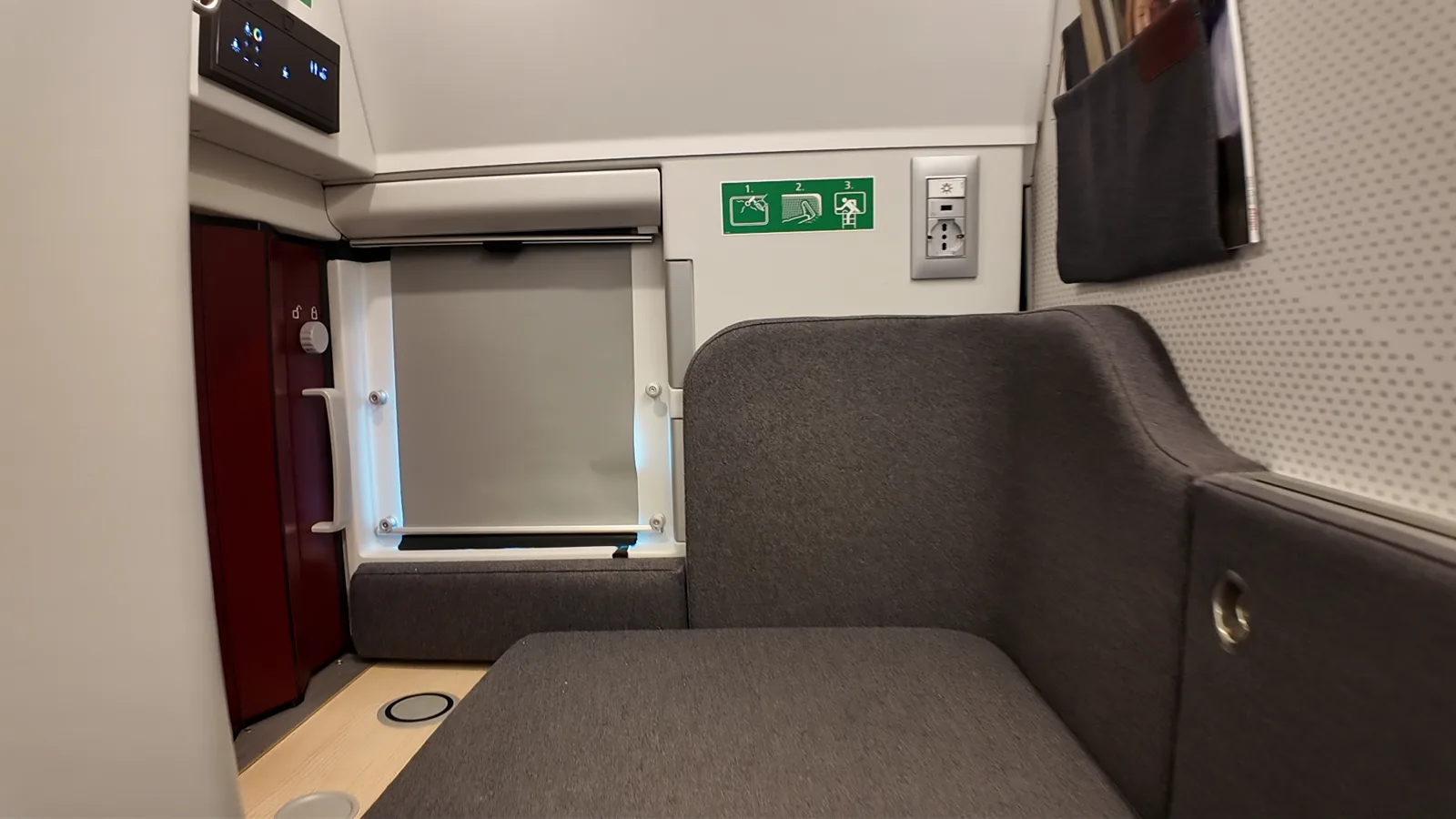 Upper ÖBB Nightjet Mini Cabin with mattress, window, socket, and storage pockets