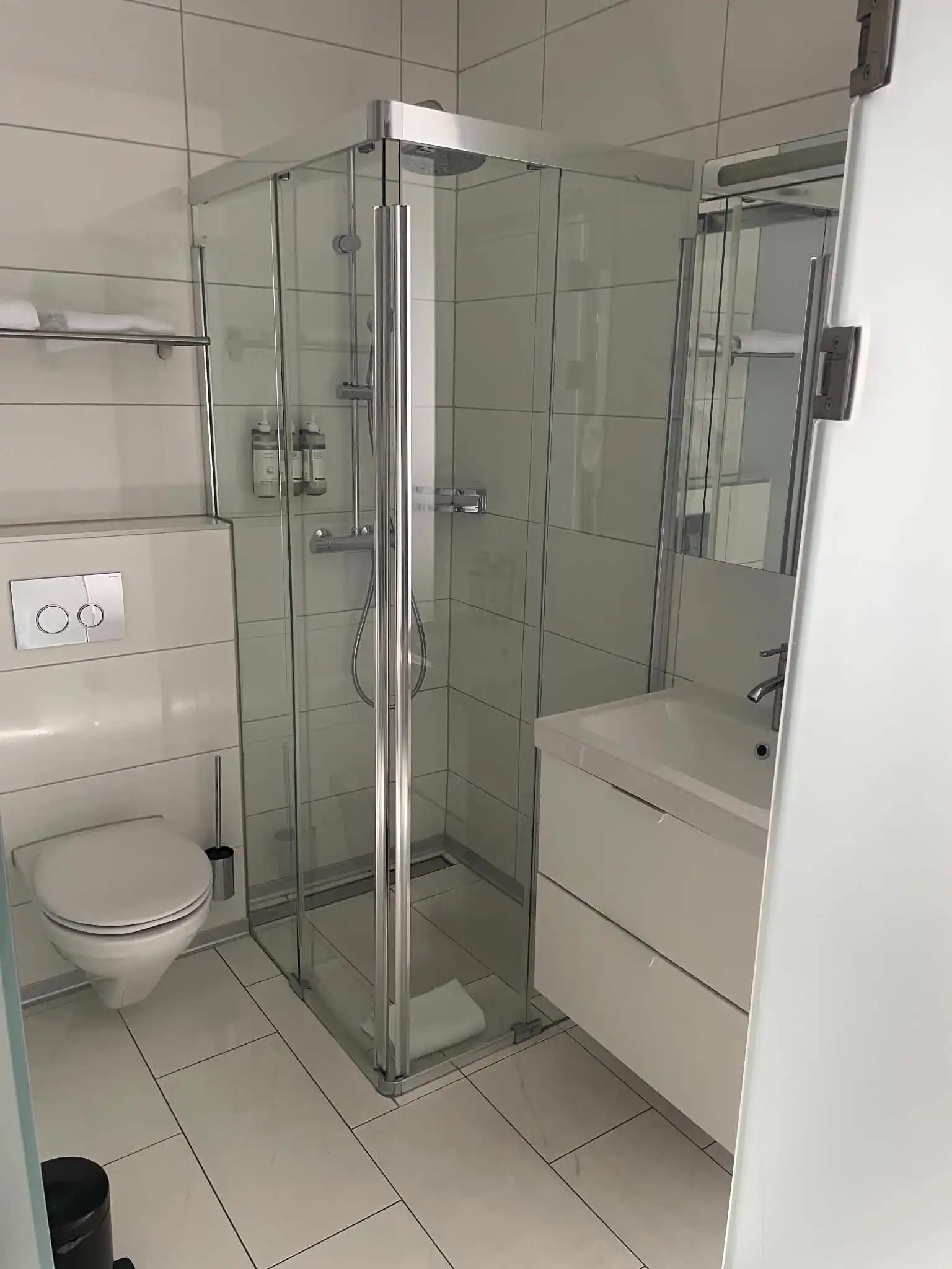 Private bathroom and shower in a studio at Hotel Numa Zurich Turi