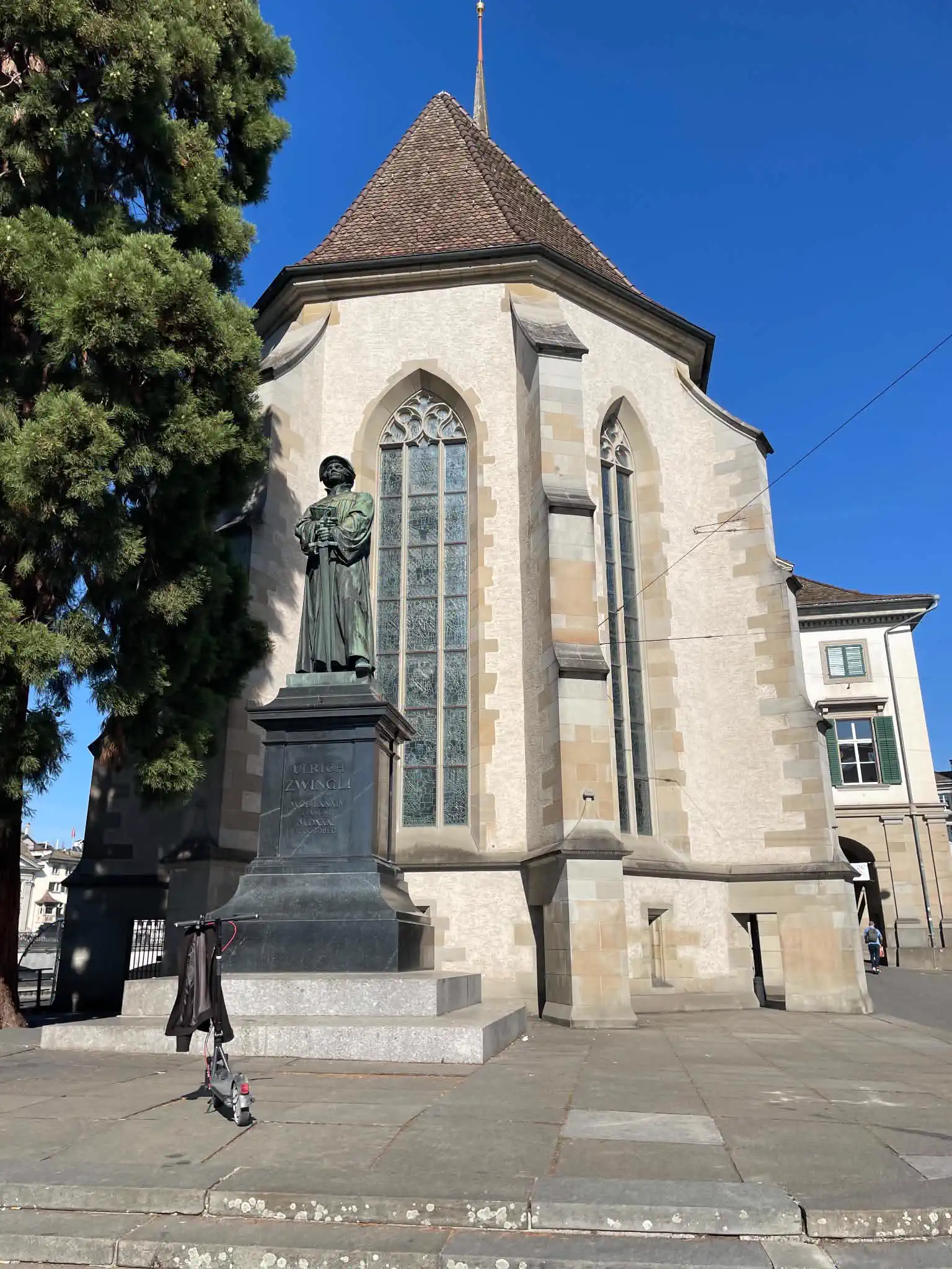 Wasserkirche and the Ulrich Zwingli statue in Zürich old town